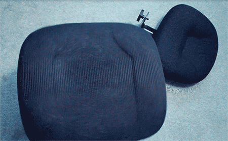 An office chair with the back removed